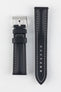 Upper side of Artem Straps Classic Black Sailcloth watch strap with grey stitching and Artem Straps embossed silver buckle.