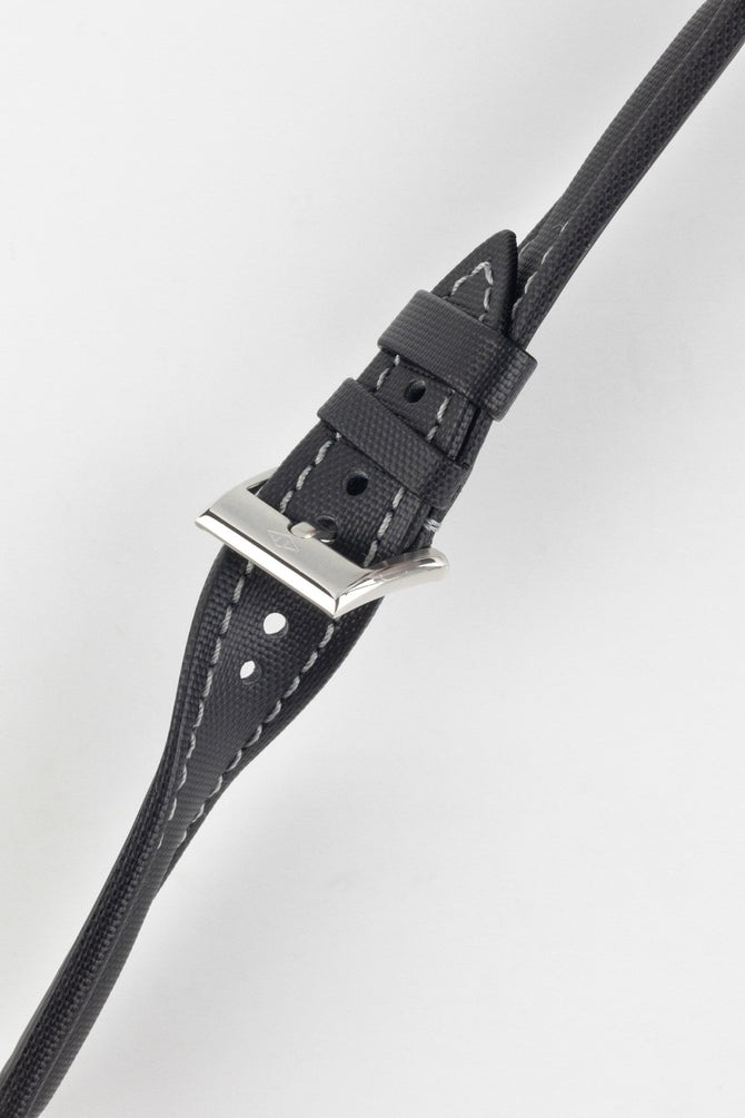 Black Artem Classic Sailcloth with grey stitching watch strap buckled and twisted to show flexibility and durability.