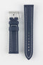 Upper side of Navy Blue Artem Straps classic sailcloth white stitching watch strap with Stainless Steel Artem logo embossed pin buckle