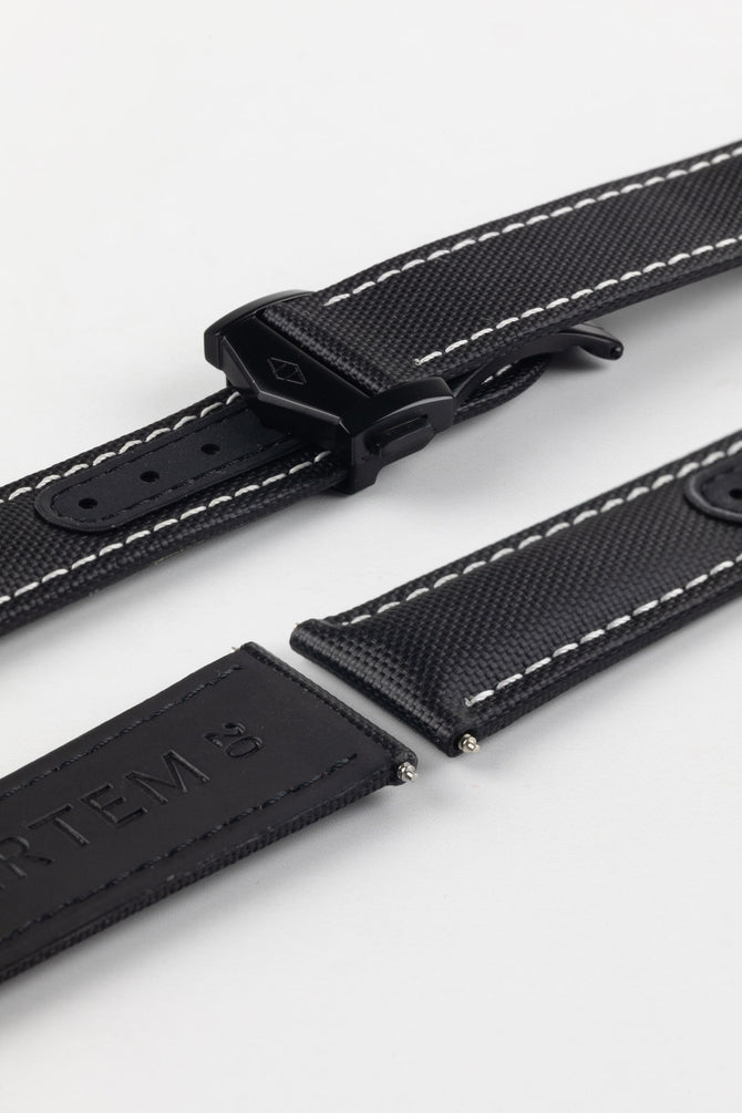 Artem Loop-Less Deployment clasp in DLC black attached to the black Loop-Less sailcloth watch strap with white stitching