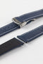 Stainless steel Loop-Less deployment clasp on top of silicone adjustment holes and Navy Blue Artem Sailcloth watch strap with white stitching and rubber coated leather underside