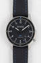 Close up of Bremont Boeing Watch with black dial, date between 4 and 5 o'clock.