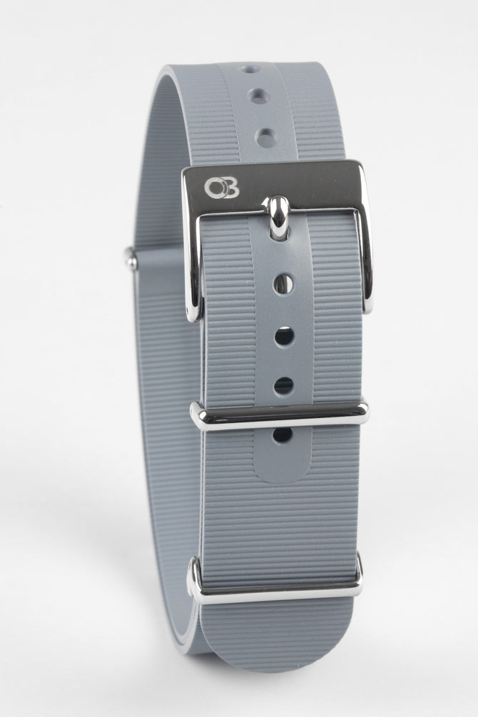 Light grey bonetto cinturini 328 rubber one piece watch strap buckled and curved featuring logo embossed buckle