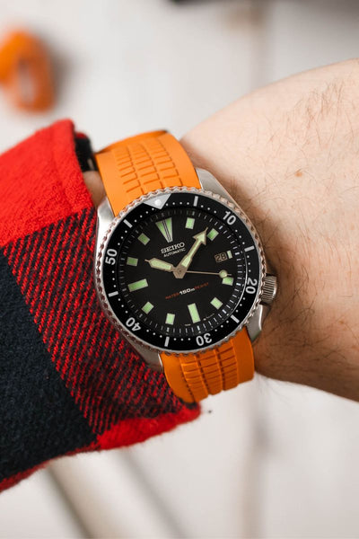 Seiko SKX black bezel and dial fitted with Crafter Blue CB11 Orange on wrist