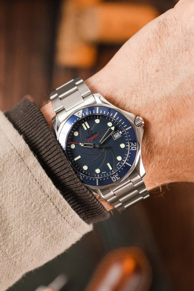 Omega Seamaster Bond 300 Blue Dial fitted with Forstner Model O Oyster Style watch bracelet brushed finish worn on wrist