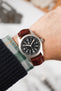 Hamilton Khaki Field Watch fitted with Hirsch Duke burgundy leather strap worn on wrist