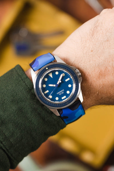 Blue Unimatic and Massena U1 fitted with Hirsch John Camo Blue Watch Strap worn on wrist