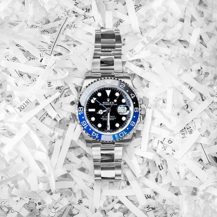 Rolex Batman set in shredded paper