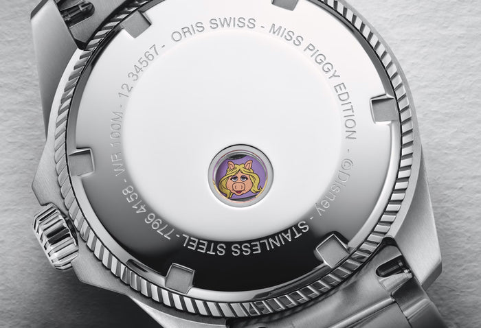 The caseback of the Oris x Miss Piggy Collaboration showing their 'spyhole' caseback.