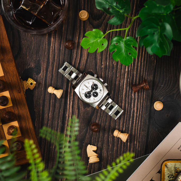 A Zenith El Primero Revival 'Lupin The Third' 2nd Edition Watch Lay on a wooden table