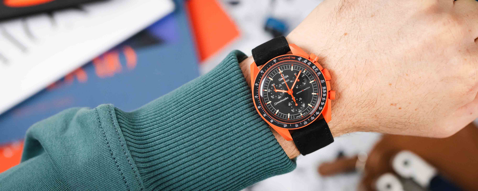 Burgundy Hirsch Osiris strap on Omega Moonswatch Pluto - High-quality, stylish design adds elegance to watch.