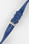 Crafter Blue watch strap done up with brushed silver stainless steel buckle twisted to show flexibility and comfort