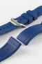 Product photo on the UX03 Rubber FKM watch strap showing the buckle done up in brushed steel, next to the underside of the strap showing the lug holes and curved fitting for comfort