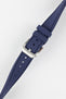 Crafter Blue watch strap done up with brushed silver stainless steel buckle twisted to show flexibility and comfort