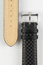 Black carbon-fibre-pattern leather watch strap with beige contrast stitching, German-made leather lining, and a polished stainless steel buckle, displayed on a white background.