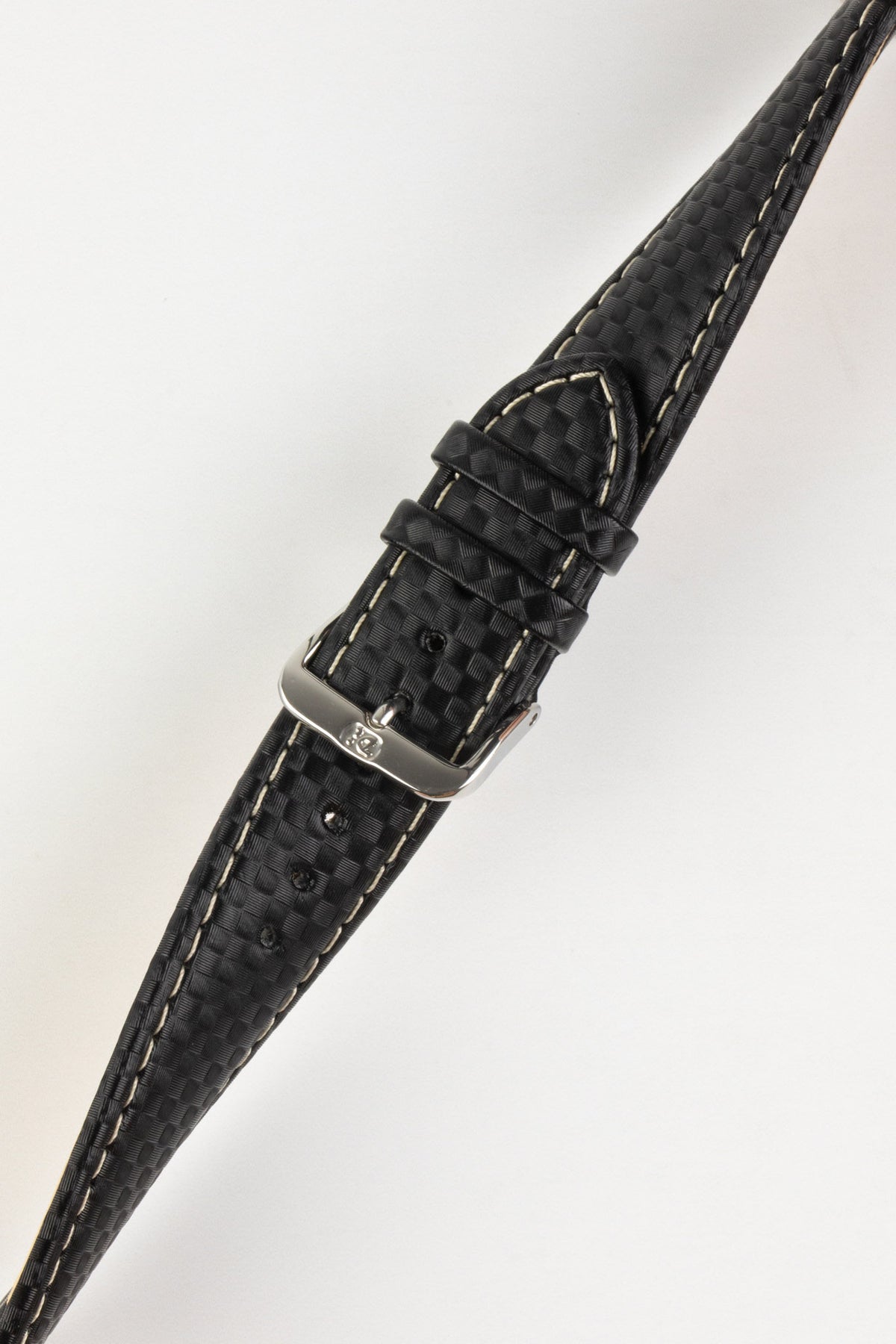 Black carbon-fibre-pattern leather watch strap with beige contrast stitching and a polished stainless steel buckle, displayed on a white background.