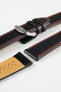 Black leather watch strap with red contrast stitching, beige perforated leather lining, and a polished stainless steel buckle, displayed on a white background.