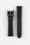 Black leather watch strap with white contrast stitching and a polished stainless steel buckle, displayed on a white background.