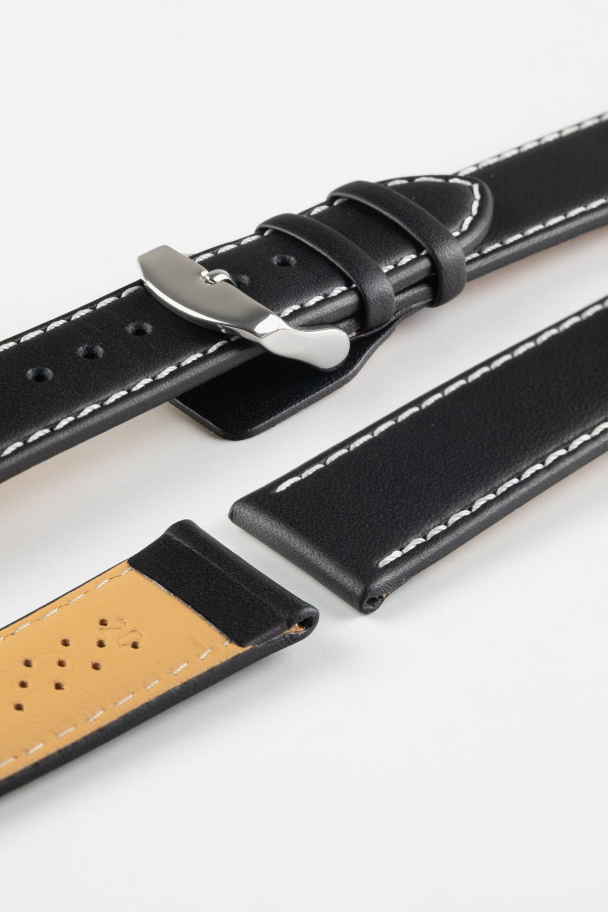 Black leather watch strap with white contrast stitching, beige leather lining, and a polished stainless steel buckle, displayed on a white background.