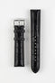 Black alligator-grain leather watch strap with matching black stitching and a polished stainless steel buckle, displayed on a white background.