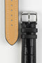 Black alligator-grain leather watch strap with a beige leather lining, matching black stitching, and a polished stainless steel buckle, displayed on a white background.