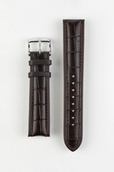 Dark brown alligator-grain leather watch strap with matching stitching and a polished stainless steel buckle, displayed on a white background.