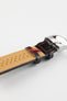 Dark brown alligator-grain leather watch strap with a perforated beige leather lining, white stitching, and a polished stainless steel buckle, shown in close-up on a white background.