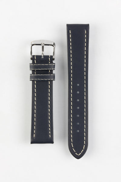 Navy blue leather watch strap with cream contrast stitching and a polished stainless steel buckle, displayed on a white background.