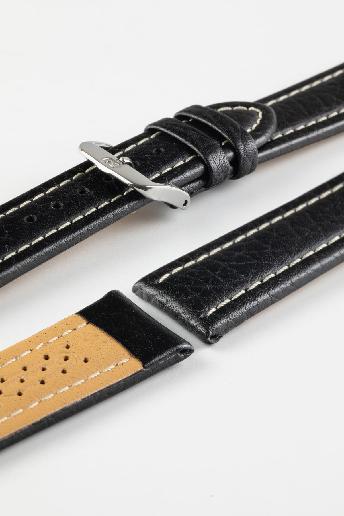 Close-up product photograph of a black vintage-style leather rally watch strap displayed on a white background. The strap is shown in multiple sections, highlighting the smooth distressed leather finish, contrasting cream stitching, padded construction, polished stainless steel pin buckle, and beige perforated leather lining. The elongated padded centre section and motorsport-inspired rally design showcase the strap's premium craftsmanship, vintage character, and comfortable fit.