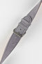 Close-up of a light grey nubuck leather watch strap with a soft matte finish, tonal grey stitching, dual keeper loops, multiple adjustment holes, and a brushed stainless steel buckle, displayed diagonally on a light grey background to highlight the tapered profile, supple suede-like texture, and premium handcrafted construction.