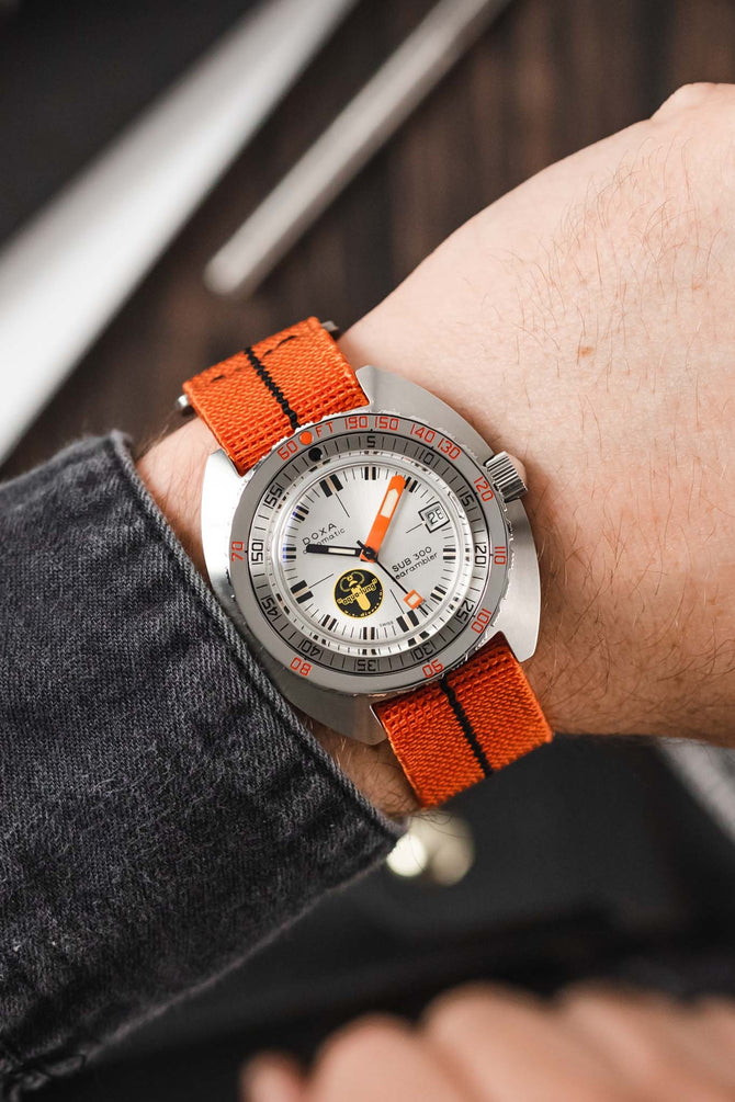 Doxa SUB 300 Searambler Silver Lung Limited Edition fitted with Erika's Originals Orange MN watch strap with black centerline on wrist