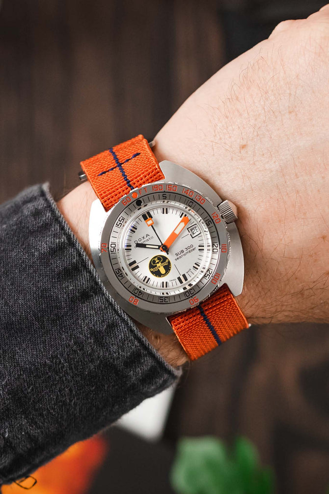 Doxa SUB 300 Searambler Silver Lung Limited Edition fitted with Erika's Originals Orange MN watch strap with navy blue centerline on wrist