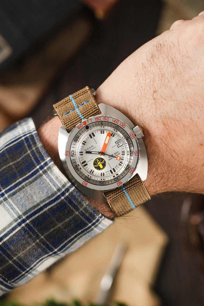 Doxa SUB 300 Searambler Silver Lung Limited Edition fitted with Erika's Original SAHARA MN watch strap with turquoise centerline on wrist