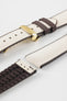 Beige textile-effect watch strap with brown rubber backing and a gold-tone deployment clasp, shown in separate sections on a white background. Features a woven-look surface, brown edges, and a patterned rubber underside.