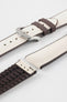 Beige textile-effect watch strap with brown rubber backing and a silver-tone buckle, shown in separate sections on a white background. Features a woven-look surface, brown edges, and a patterned rubber underside.
