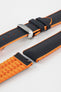 Black textile-effect watch strap with bright orange rubber backing and a silver-tone folding clasp, shown in separate sections on a white background. Features a textured woven-look surface, orange edges, and a patterned rubber underside.