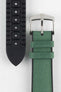 A detailed close-up of a dark green Hirsch Arne Animal-Free Sailcloth Effect Performance watch strap laid out on a white surface. The image clearly shows the textured green fabric on the top, the black rubberized underside with ventilation channels and the word "Arne" and "20" embossed, and the polished silver buckle.