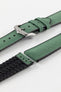 A Hirsch Arne Dark Green Animal-Free Sailcloth Effect Performance Watch Strap is displayed, showcasing the strap's full length and a polished silver pin buckle. The textured sailcloth-like material of the dark green strap is clearly visible, along with the black rubberized underside.