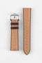 Golden brown textile-effect watch strap with a silver-tone buckle, displayed in two separate pieces on a white background. Features brown edges, a woven-look texture, and multiple adjustment holes.