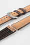 Golden brown textile-effect watch strap with brown rubber backing and a brushed silver-tone buckle, shown in separate sections on a white background. Features a woven-look surface, brown edges, and a patterned rubber underside.