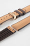 Golden brown textile-effect watch strap with brown rubber backing and a rose gold-tone deployment clasp, shown in separate sections on a white background. Features a woven-look surface, brown edges, and a patterned rubber underside.