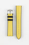A Hirsch Arne Yellow Animal-Free Sailcloth Effect Performance Watch Strap is displayed on a white background, showcasing the strap's full length and a silver pin buckle. The textured sailcloth-like material of the yellow strap is clearly visible, along with the black rubberized underside.