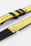 Detailed view of a Hirsch Arne watch strap, featuring a bright yellow sailcloth-textured surface with black leather accents and a black deployment clasp. The strap is partially detached, showing the pin mechanism.
