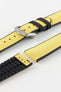 Detailed view of a Hirsch Arne watch strap, featuring a bright yellow sailcloth-textured surface with black leather accents and a polished silver pin buckle. The strap is partially detached, showing the pin mechanism.