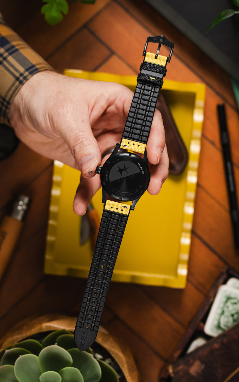 Underside of the Hirsch Arne Limited Edition watch strap in yellow, highlighting its performance lining.