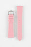 Product shot of a pink textured leather watch strap displayed against a white background, showing both sections separately: one with a polished silver-tone pin buckle and two keepers, and the other with a pointed tip and multiple adjustment holes, highlighting the white contrast stitching and fine grain texture.