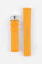 Bright orange watch strap with a textured carbon-pattern finish and silver-tone buckle, displayed in two separate pieces on a white background. Features contrast white stitching and multiple adjustment holes.