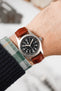 Hamilton Khaki Field Watch fitted with Hirsch Duke gold brown leather strap worn on wrist