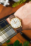 Orient Bambino fitted with Hirsch Duke Taupe leather watch strap worn on wrist