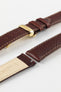 Close-up of HIRSCH Forest brown quick-release watch strap with gold deployment clasp for easy strap changes.